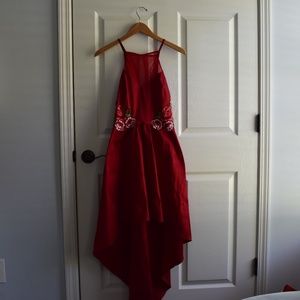 Red dress with embroidered flowers